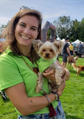 Lindsay Saggu and Bella, canine customer, at Pet-A-Palooza Victoria 2019 with new brand colours
