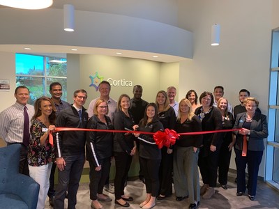 Heather Moor, Director, Carlsbad Care Center, cut a ribbon during the Cortica Carlsbad grand opening ceremony joined by representatives of the Carlsbad Chamber of Commerce and Cortica. Heather Moor, Director, Carlsbad Care Center, cut a ribbon during the Cortica Carlsbad grand opening ceremony joined by representatives of the Carlsbad Chamber of Commerce and Cortica.