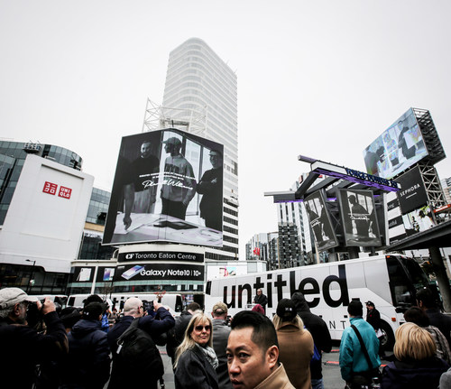 Pharrell Williams announced an unprecedented collaboration with Reserve Properties and Westdale Properties on a new residential development called untitled.  Video message from Pharrell aired at Toronto's Yonge-Dundas Square at 10:35 a.m. today. (Photo credit: Anthony Cohen) (CNW Group/Reserve Properties)