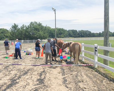 Navy veteran Jessenia Smith and her husband Truitt experienced the healing nature of caring for horses at a Wounded Warrior Project® (WWP) equine therapy workshop in Virginia. Their love for animals enhanced the workshop’s impact and helped them interact with other veterans. “Attending Wounded Warrior Project events made my journey relevant,” Jessenia said. Navy veteran Jessenia Smith and her husband Truitt experienced the healing nature of caring for horses at a Wounded Warrior Project® (WWP) equine therapy workshop in Virginia. Their love for animals enhanced the workshop’s impact and helped them interact with other veterans. “Attending Wounded Warrior Project events made my journey relevant,” Jessenia said.