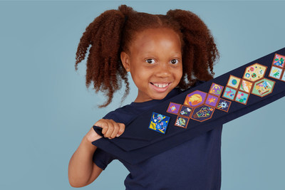 Guide shows off her new Digital Defender badge from Girl Guides of Canada, developed in partnership with BlackBerry. Girls of all ages, can learn about the cyber threats they might face, how cybersecurity works, how it impacts their daily lives, and get exposure to careers in cybersecurity. (CNW Group/Girl Guides of Canada)