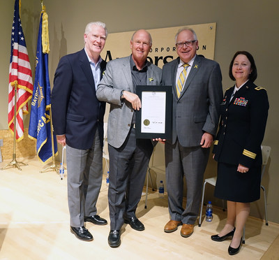 Minnesota Gov. Tim Walz proclaimed Andersen Corporation a Yellow Ribbon company Nov. 6 for its dedication to America's service members. Shown here are (left to right): Paul Delahunt, president of Renewal by Andersen; Jay Lund, chairman and CEO of Andersen Corporation; Minnesota Gov. Tim Walz; and Maj. Gen. Johanna Clyborne, deputy adjutant general for the Minnesota National Guard.