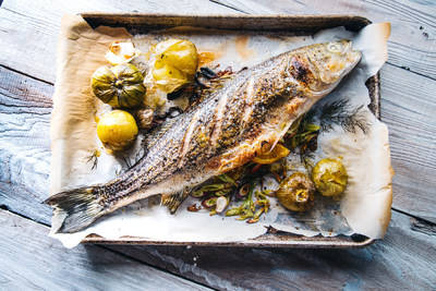 Pacifico Whole True Striped Bass with Citrus and Herbs, Credit Eric Wolfinger