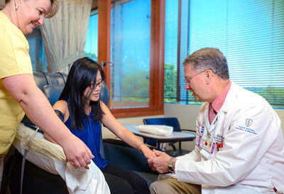 Dr. Richard Furie with a patient Dr. Richard Furie with a patient