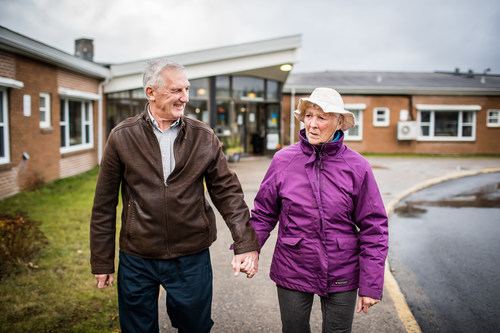 Taking daily walks together. Mr David Clothier with his wife and Bay St. George Long Term Care Centre resident Mrs Madonna Clothier (CNW Group/Canadian Foundation for Healthcare Improvement)