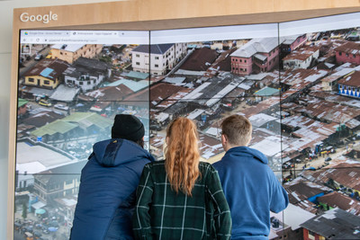Students view the impact of urban sprawl through the dynamic artwork of Edward Burtynsky.
Photo: Tanya Kirnishni/ Canadian Geographic (CNW Group/Royal Canadian Geographical Society)