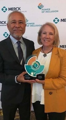 Rico Viray (left) and Susan Miller Viray (right), founders of The Bloc, accept the Diversity Award on behalf of The BlocPartners.