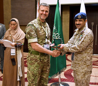 A participant in the 1st KSA-UK Workshop on Stabilisation with Saudi Royal Air Force Gen. Abdullah Alhababi (right) in Riyadh, Saudi Arabia (14 Nov 2019)