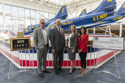 On Veterans Day, U.S. Money Reserve presented the Naval Aviation Museum Foundation with a donation check for $60,000 and the exclusive “Great War Series” set of gold and silver coins commemorating the end of WW1. Pictured from left to right: Jim Warren (VP of Marketing and Communication, USMR), retired Marine Lt. Gen. Duane Thiessen (President, NAMF), Cindy McCalip Vice President, NAMF), and Christol Farris (VP of Media, USMR).