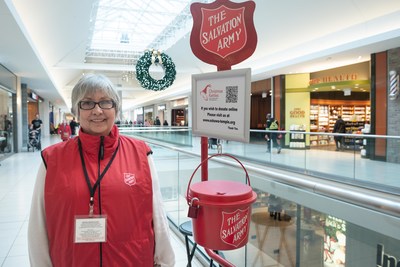 Salvation Army volunteer supports annual kettle campaign. (CNW Group/The Salvation Army)