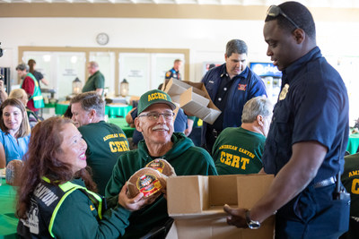 American Canyon Firefighters hand out Hormel® Cure 81® holiday hams to CERT/CART members at Thanksgiving luncheon.