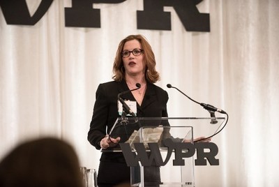Maura Corbett, Chief Executive Officer and Founder, Glen Echo Group, accepts the 2019 WWPR Woman of the Year Award.