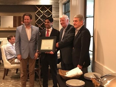 Dr.Ghatnekar (second from left) of Firststring Research receives a Certificate of Recognition for research on traumatic cell injuries.  Congressman Cunningham (far left), Mr. Howell (second from right), and LTG (Ret.) Thompson (right) presented the certificate at Monday's luncheon.