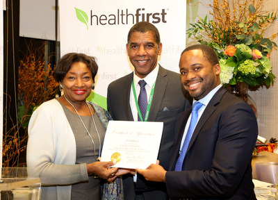 New York State Senator Andrea Stewart-Cousins presents a Certificate of Appreciation to Healthfirst to commemorate the grand opening of its Yonkers Community Office.  Pictured (L-R): Senator Stewart-Cousins; Roland Foster, AVP, Market Development Healthfirst; Errol Pierre, SVP State Programs, Healthfirst