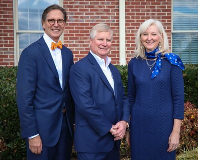 Fellow owners George Wallace (left) and Jim Wallace (middle) announced Stallings' new role to CBWW staff and agents in a celebratory meeting at the franchise's Bearden office on Nov. 20, 2019.