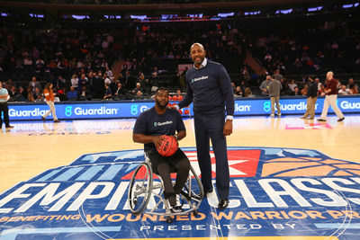 Basketball legend Alonzo Mourning partners with Guardian Life to showcase that disability is not inability during a game of HORSE with wheelchair basketball star Chris Saint-Remy of CUNY during the 2K Empire Classic at Madison Square Garden on Thursday, Nov. 21, 2019 in New York. (Stuart Ramson/AP Images for Guardian Life Insurance)