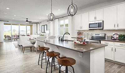 Richmond American’s Ruby II plan at Seasons at Hillside in Leesburg, FL, offers an inviting kitchen and great room.