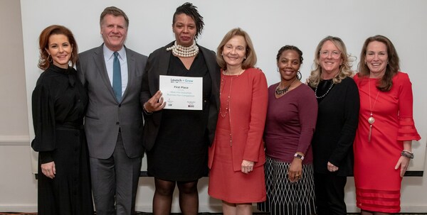 Launch + Grow business plan competition first place winner Adriane Mack (center) pictured with judges Stephanie Ruhle, Joe Kernen, Ellen R. Alemany, Toya Williford, Deirdre Quinn and Operation HOPE’s Mary Erhsam.