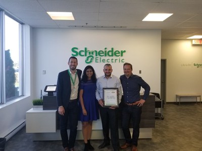 Gaetan Djenane and Lakmini Perera of Schneider Electric Canada with Florent Mecca of Consult-Elect, and Ludovic Debuchy of Schneider Electric Canada. (CNW Group/Schneider Electric Canada Inc.)