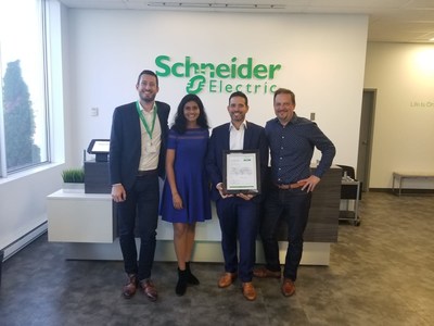 Gaetan Djenane and Lakmini Perera of Schneider Electric Canada with Nick Folino of McRae Electric Ltd., and Ludovic Debuchy of Schneider Electric Canada. (CNW Group/Schneider Electric Canada Inc.)