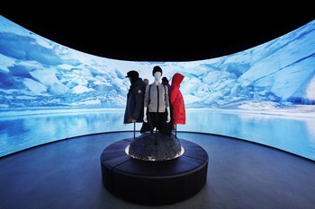 The Elements Room: 60-foot wide curved displays project bespoke seasonal landscape content. (CNW Group/Canada Goose)