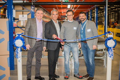 From L to R: Guy Toksoy, vice president, operations, SCI; Chris Galindo, CEO, SCI; Alexis Lanternier, executive vice president e-commerce, Walmart Canada; Daryl Porter, vice president, e-commerce operations and logistics, Walmart Canada. (CNW Group/SCI Group Inc.)