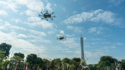 2 EHang passenger-grade AAVs performed simultaneous flight in the downtown area and CBD of Guangzhou city, near the landmark of Canton Tower and LIEDE Bridge where are must-see sightseeing place for all tourists in Guangzhou.
