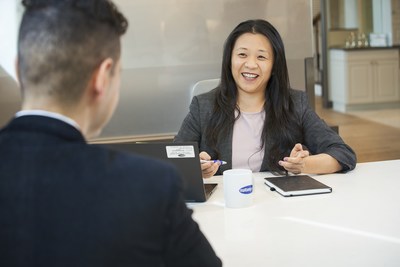 Rachel Suh of Mattamy Homes meets with a colleague at the company's Milton office. (CNW Group/Mattamy Homes Limited)