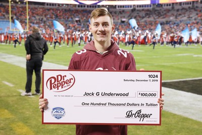 An overjoyed Jack Underwood celebrates winning $100,000 in tuition after competing in the Dr Pepper Tuition Giveaway during halftime of the ACC Conference Championship (Photo Credit: Dr Pepper)