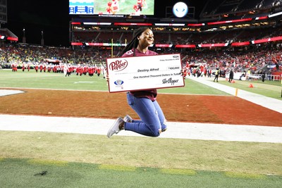 Destiny Alfred secured $100,000 in free tuition after competing in the Dr Pepper Tuition Giveaway during the halftime of the PAC 12 Conference Championship (Photo Credit: Dr Pepper)