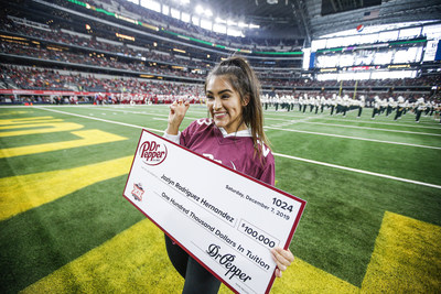 Taking home $100,000 in tuition, Jazlyn Rodriguez Hernandez seen here after competing in the Dr Pepper Tuition Giveaway during the halftime of the BIG 12 Conference Championship (Brandon Wade/AP Images for Dr Pepper)