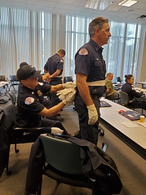 Long Beach firefighters simulate a stroke.