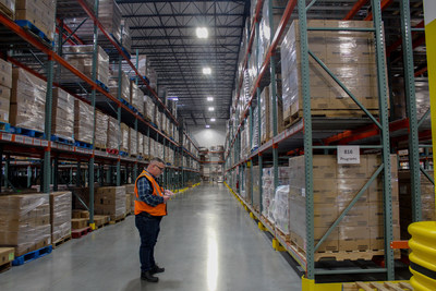 Workers track food and supplies at North Texas Food Bank.