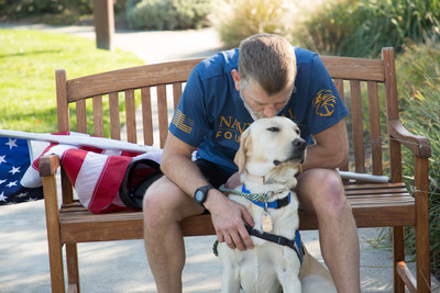 Canine Companions service dogs assist military veterans with PTSD in task-trained commands.