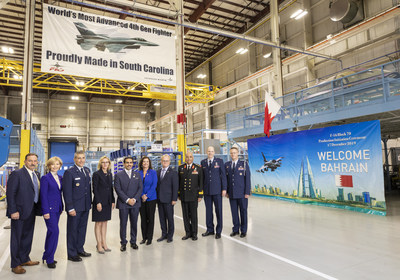 Shaikh Abdullah bin Rashed Al Khalifa, ambassador of the Kingdom of Bahrain to the United States (center) tours the Lockheed Martin F-16 production line in Greenville, South Carolina, on Dec. 17.