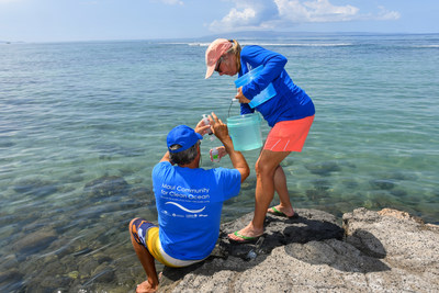 Volunteers with Maui's community-based Hui O Ka Wai Ola ocean water quality monitoring program gather water samples at a site in West Maui.  The program is supported by Hawaii Tourism Authority, County of Maui Office of Economic Development, Napili Bay and Beach Foundation, North Beach West Maui Benefit Fund, Honua Kai West Maui Community Fund, LUSH Cosmetics Charity Pot, Makana Aloha Foundation, Fred Baldwin Memorial Foundation and others. Photo by Bruce Forrester.