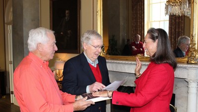 The December 20, 2019 ceremonial swearing-in of LaJuana S. Wilcher of Warren County, Ky. by U.S. Senate Majority Leader Mitch McConnell in his United States Capitol Office. (L to R: Ms. Wilcher's husband Edwin Tivol, U.S. Senate Majority Leader Mitch McConnell, and LaJuana S. Wilcher). Photo provided by the Office of Senator Mitch McConnell for Kentucky.