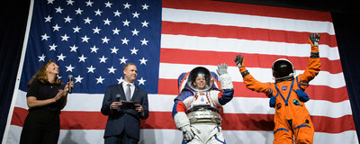 NASA spacesuit engineer Amy Ross and NASA Administrator Jim Bridenstine introduce spacesuit engineer Kristine Davis, wearing a ground prototype of NASA&rsquo;s new Exploration Extravehicular Mobility Unit (xEMU), and Orion Crew Survival Systems Project Manager Dustin Gohmert, wearing the Orion Crew Survival System suit, Oct. 15, 2019 at NASA Headquarters in Washington. Credit: NASA
