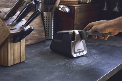 Pictured: Work Sharp E5 Electric Kitchen Knife Sharpener -  premiere knife sharpener applies sharp, optimal edges, offers custom angles, three sharpening modes, and counter-friendly design .