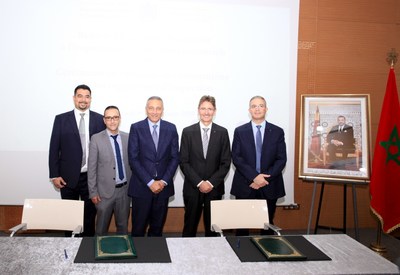 From Left to Right: Mr. Fares Naouri (Global Manager Government Inspections & International Trade - TUV Rheinland); Mr. Mohamed Alikkane (Managing Director - TUV Rheinland Morocco), H.E. Moulay Hafid Elalamy (The Minister of Industry, Trade, Green and Digital Economy), Mr. Andreas Hofer (Regional Executive Vice President India, Middle East, Africa & Asia Pacific - TUV Rheinland) & Mr. Tarek Khelifi (Managing Director - TUV Rheinland Tunisia).