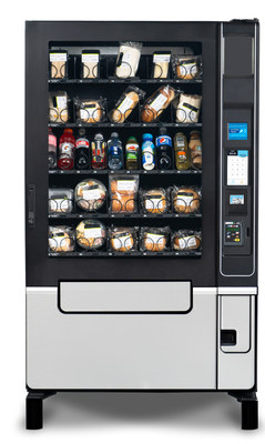 U-Select-It's New Evoke Combo 5 Elevator Merchandiser - With up to 60 selections, the Evoke Combo 5 Elevator features a soft elevator delivery to vend fragile items from all trays and ensures optimal product rotation through First-In First-Out (FIFO) loading.