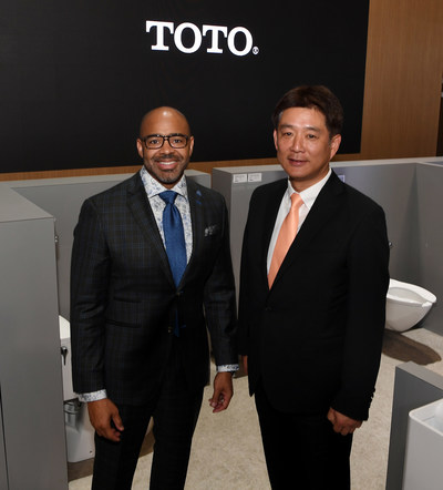 (L-R) Dr. Kofi Smith, President and CEO of Atlanta Airport Terminal Company, and Shinya Tamura, CEO of TOTO USA, discuss TOTO’s long-term relationship with Hartsfield-Jackson Airport. TOTO installed its smart-sensor EcoPower products in 2005, saving the airport money on its water and electricity bills. Now, its EcoPower faucets and flush valves offer IoT connectivity to help the airport provide passengers a clean, comfortable restroom experience. (Photo by Denise Truscello/Getty Images for TOTO)