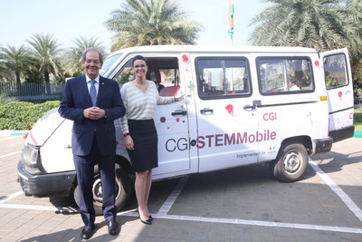 Serge Godin, Founder and Executive Chairman of the Board (left) and Julie Godin, Vice-Chair of the Board and Executive Vice-President, Chief Planning and Administration Officer (right) and the CGI Mobile STEM Lab
