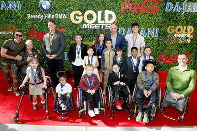 The children and para-atheltes of Angel City Sports, the official beneficiary of Gold Meets Golden, presented by Coca-Cola, BMW Beverly Hills and FASHWIRE.