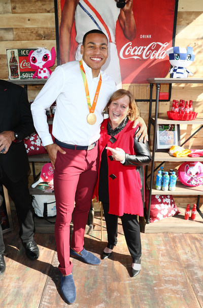 Paralympian Roderick Townsend with Dina Gerson of Coca-Cola at the Coca-Cola Tokyo-themed Bodega, Gold Meets Golden 2020.