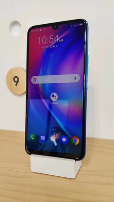TECNO CAMON 12 PRO with the Google Assistant Button displayed at the Google booth