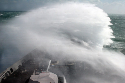 Waves crash over the bow of the amphibious transport dock ship USS San Antonio (LPD 17) as the ship speeds to the last known location of a missing fishing vessel off the North Carolina coast in 2007. The ship braved 14-foot waves during the search for the craft, which reported losing electronic and navigation capabilities. The craft returned to port using a magnetic compass. (U.S. Navy photo by Mass Communication Specialist 1st Class Erik N. Hoffman)