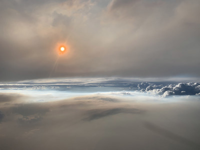 Photo of a Pyrocumulonimbus cloud (pyroCB) taken over the Pacific Northwest on Aug. 8, 2019 during the FIREX-AQ field campaign from the cockpit of the NASA DC-8 aircraft. (U.S. Navy photo by Dr. David Peterson)