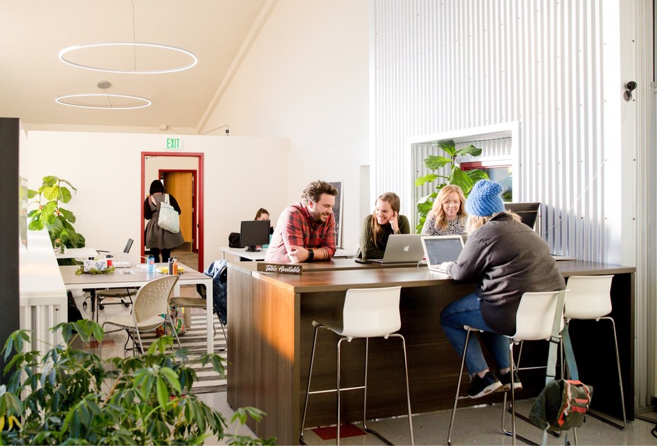 Proximity staff work from a company-operated coworking space in Grand Junction in one of western Colorado's opportunity zones.