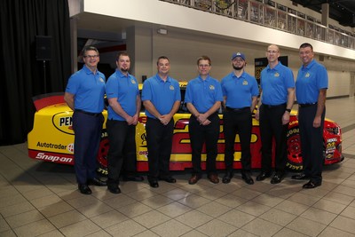 The Penske Truck Leasing Tech Showdown competition featured about 1,300 Penske technicians and customer service representatives across North America. Here are the top five competitors in the exhaust stream management event, with senior leaders, from left: Gregg Mangione, senior vice president of maintenance; Brenden Waggy, third place; Stanley Lindler, second place; David Sledziewski, first place; Dan Ferrer, fourth place; Mark Parisotto, fifth place; Art Vallely, president.